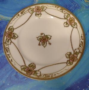 A sm plate hand painted in Nippon